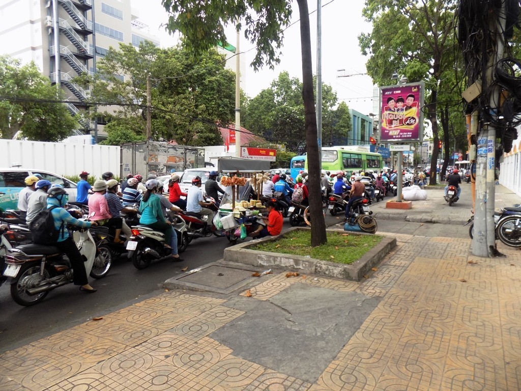 Das wilde Straßentreiben in Saigon Das wilde Straßentreiben in Saigon